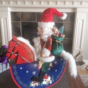 Large nostalgic Christmas decoration  nutcracker on a rocking horse wooden